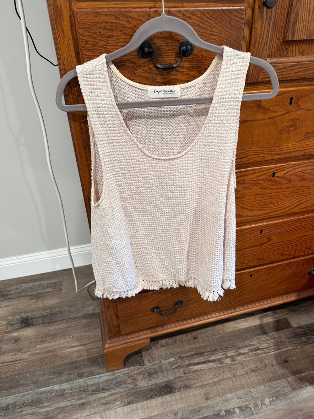 Sleeveless woven sweater